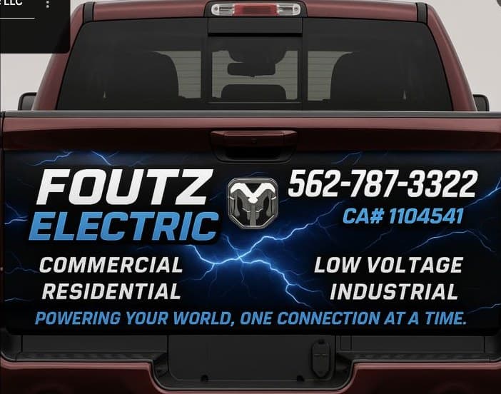 Foutz Electric branded truck with license and service categories.