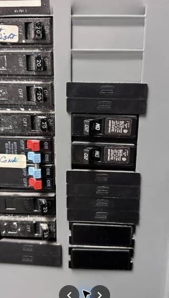 Interior panel upgrade with new breaker spaces and labeling.